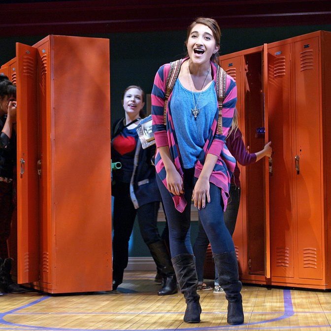 Krystina Alabado is performing on stage